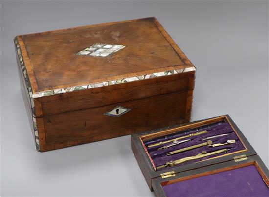 A Victorian mother of pearl and kingwood banded work box and a cased part set of drawing instruments